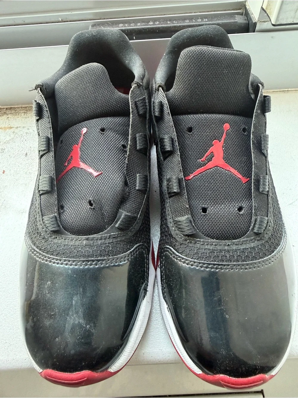 Jordan Black and Red Low-Top Sneakers